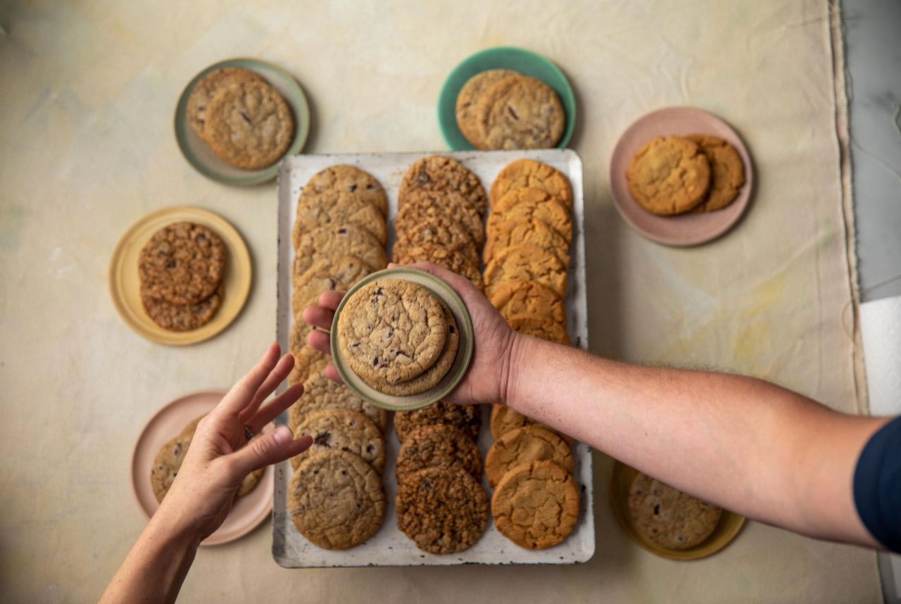 A large catering tray of various cookies