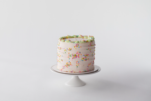 https://www.magnoliabakery.com/cdn/shop/products/6_Confetti_WC_Pink_0045_520x.png?v=1633615897